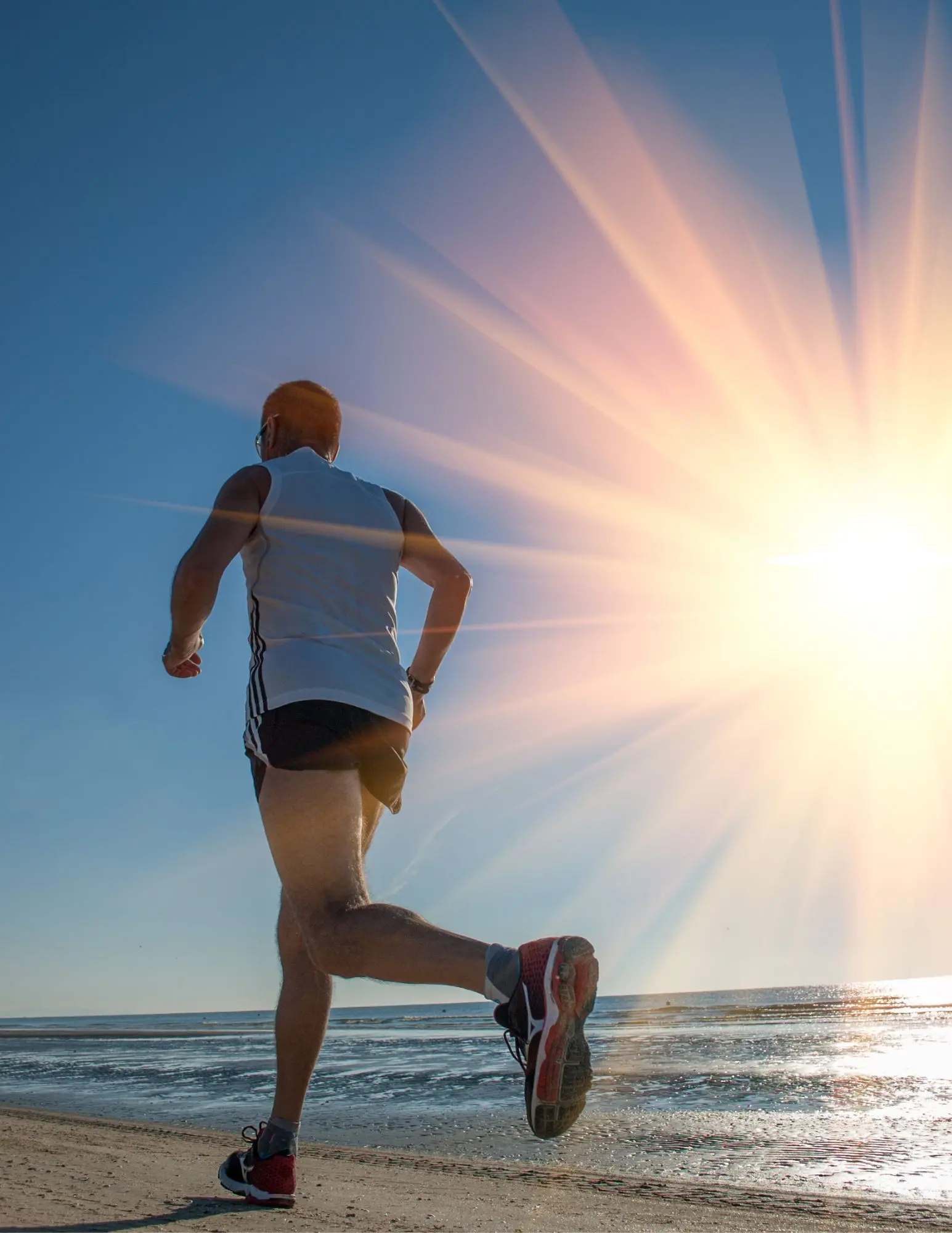 man running on beach